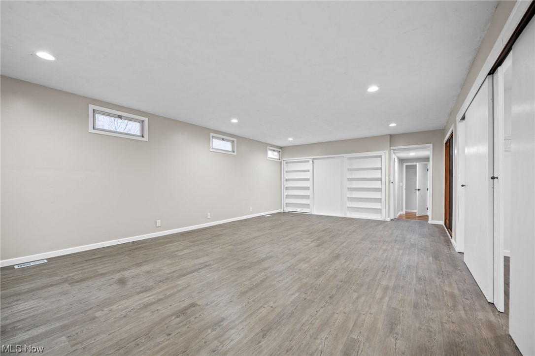 11417 Snow Road Parma Heights, OH 44130 - Photo 24 of 32 Primary bedroom with vinyl flooring