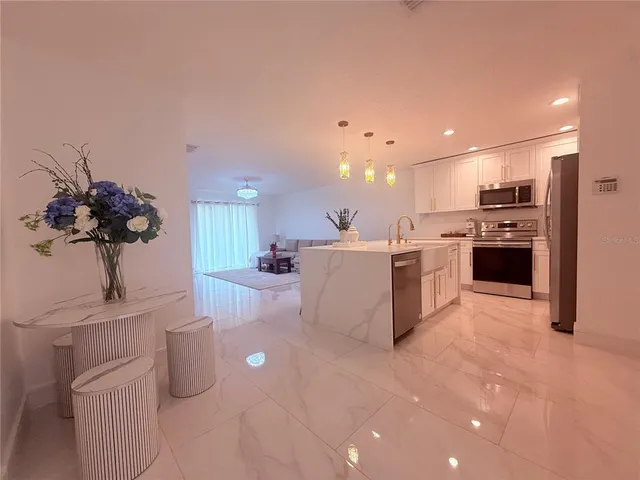 a bathroom with a sink a mirror and a toilet