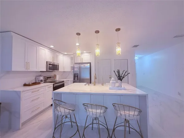 a bathroom with a sink a mirror and a toilet