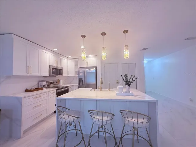 a view of a bedroom from a hallway