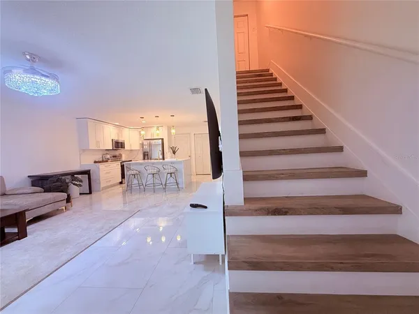 a view of a bedroom from a hallway