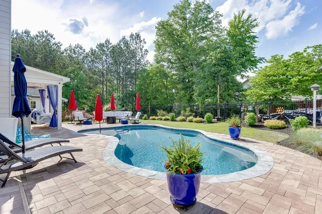 a view of outdoor space yard deck patio and swimming pool