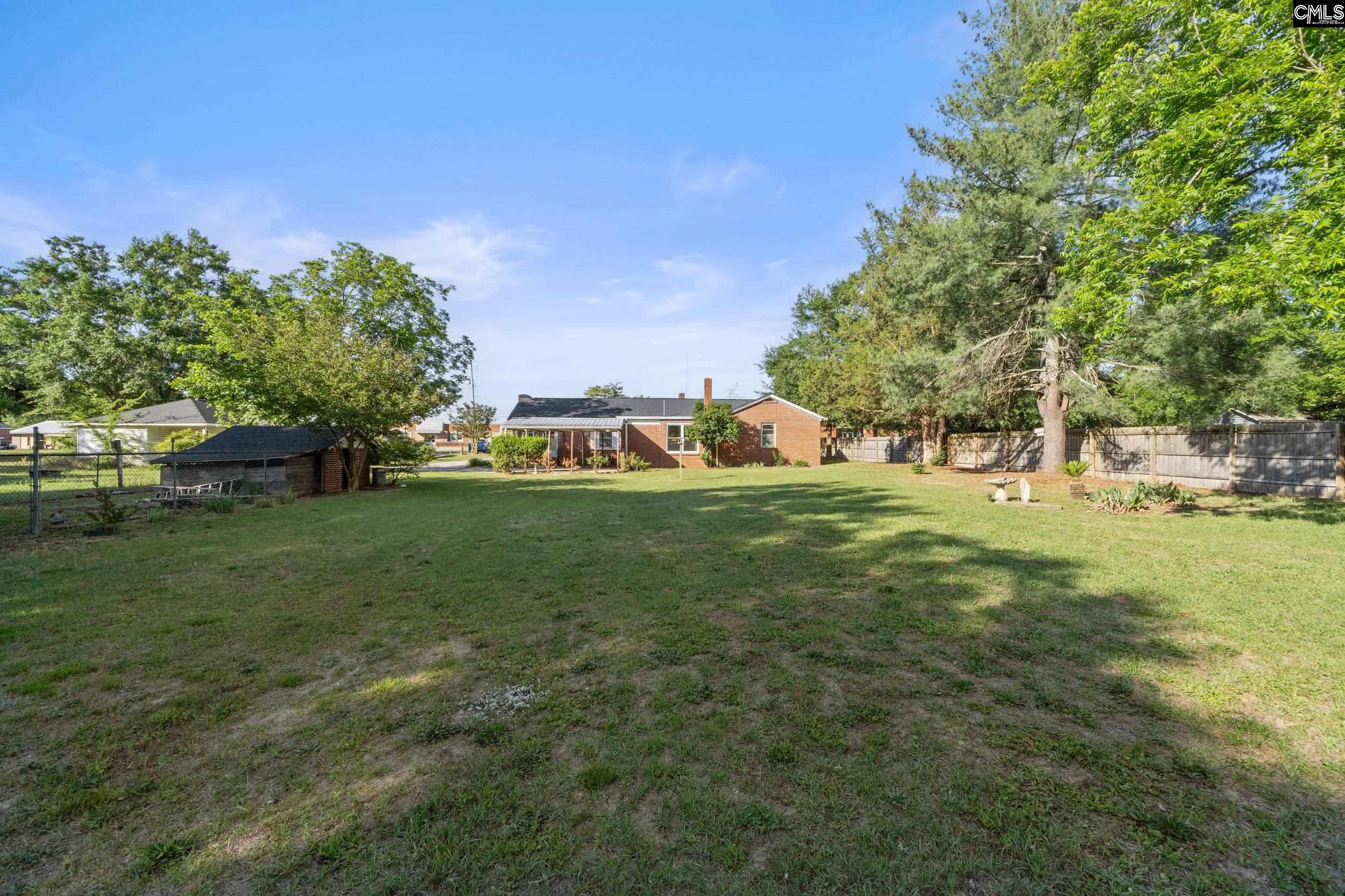 729 Magnolia Street Pelion, SC 29123 - Photo 24 of 32 a view of a park with large trees