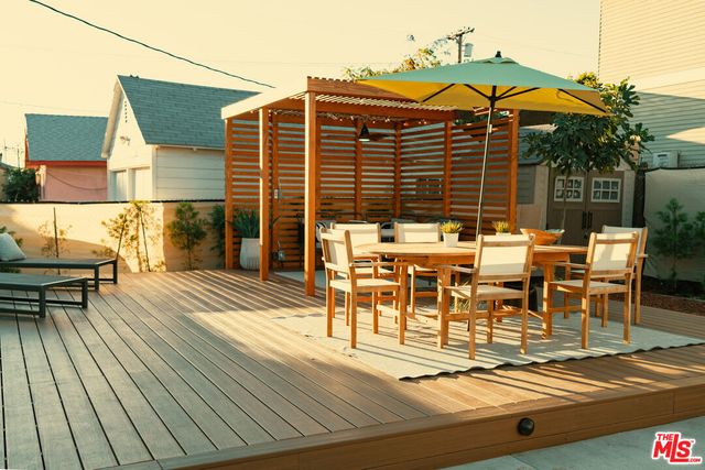a view of a dinning tables and chairs in the patio