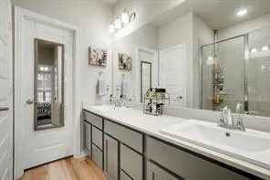 a living room with furniture a large window and a flat screen tv