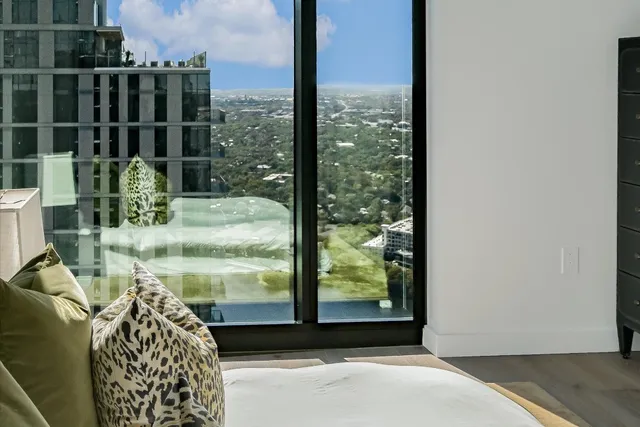 a room with a bed and a window