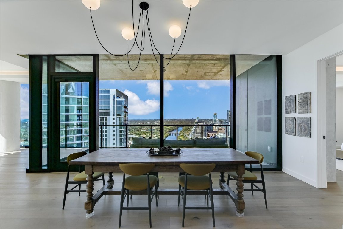610 Davis Street, Unit 4603 Austin, TX 78701 - Photo 8 of 38 a view of a dining room with furniture and window