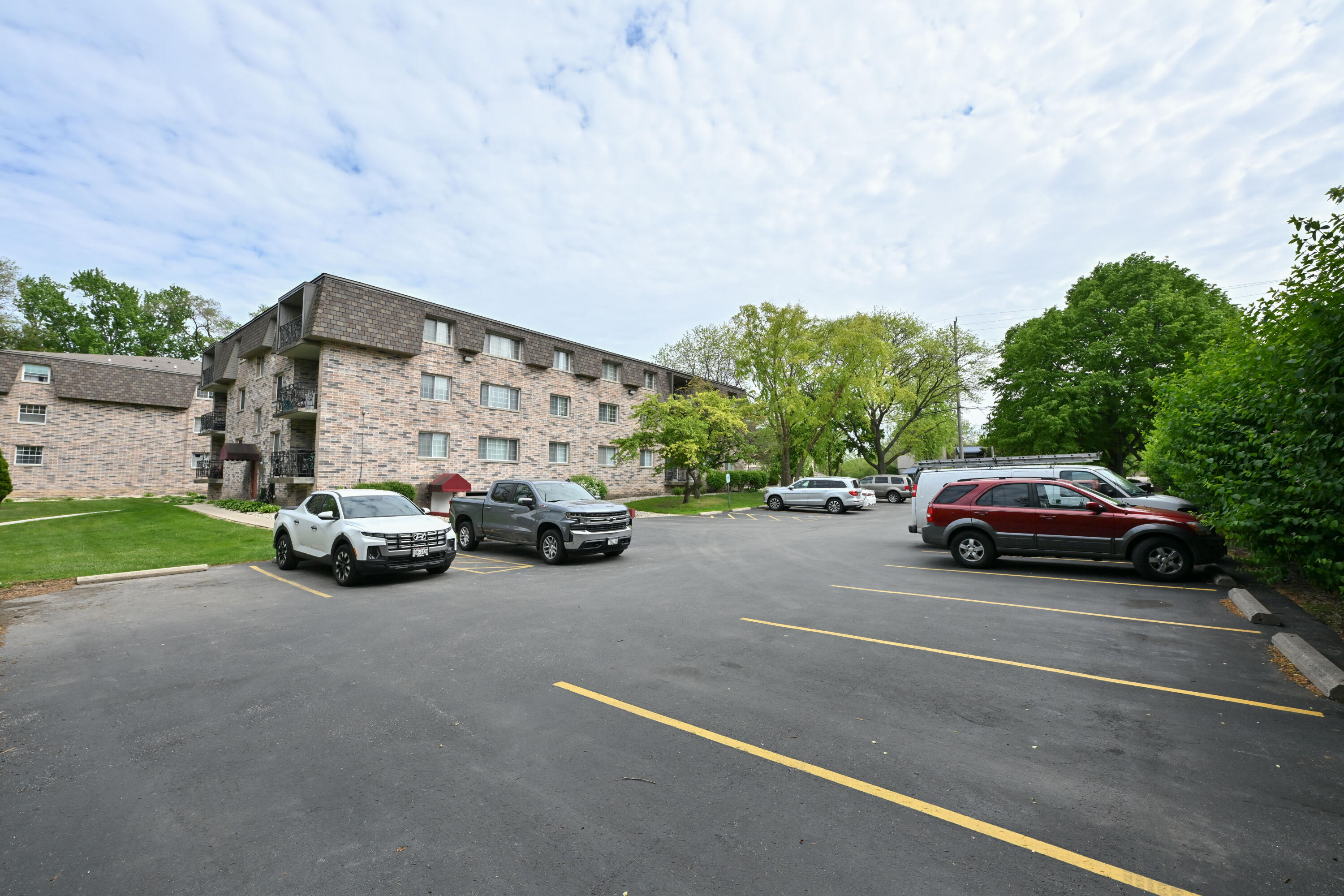 1730 West Green Tree Road, Unit 104 Glendale, WI 53209 - Photo 26 of 28 Ample surface parking