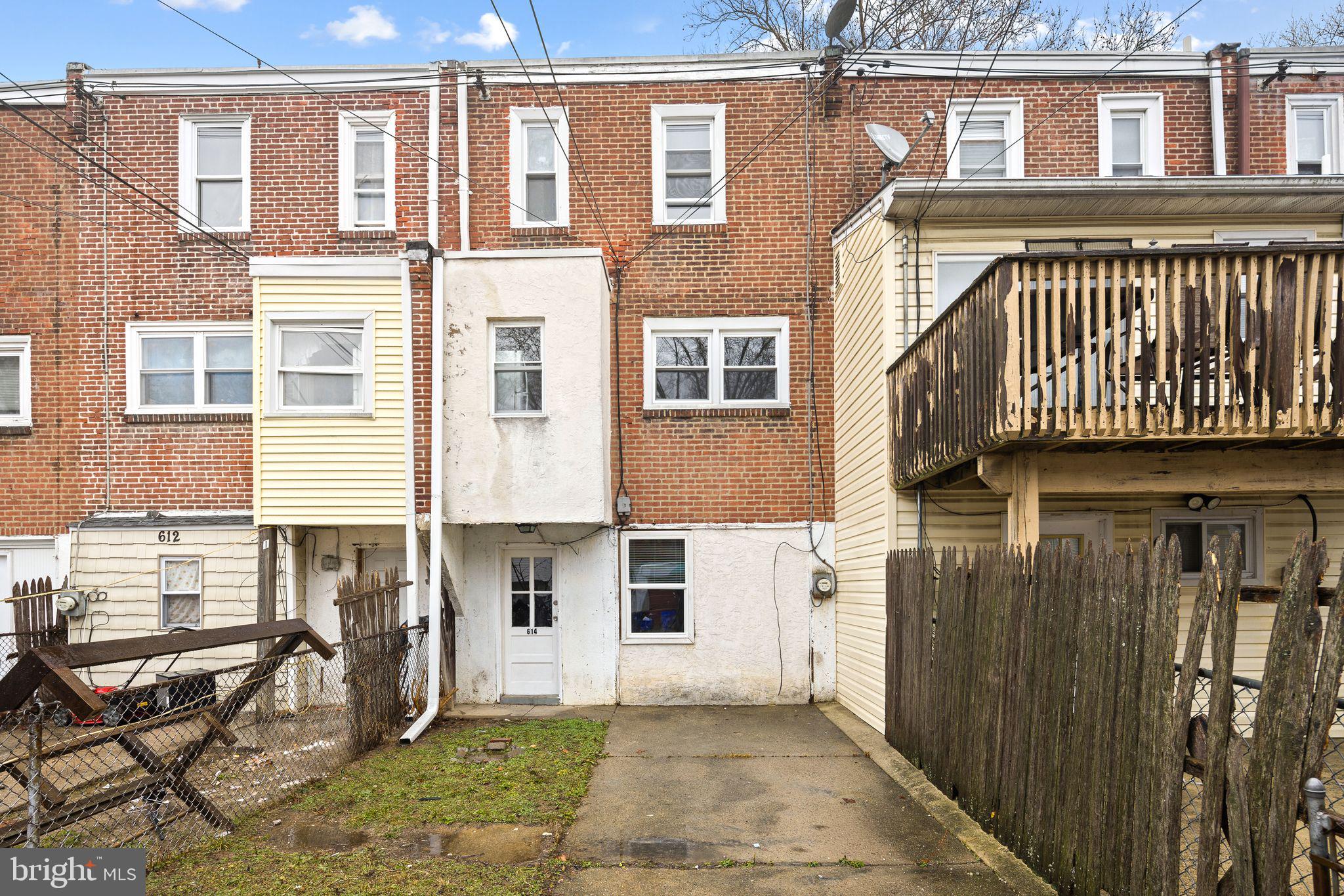 614 Littlecroft Road Upper Darby, PA 19082 - Photo 13 of 13 a view of a brick building with many windows