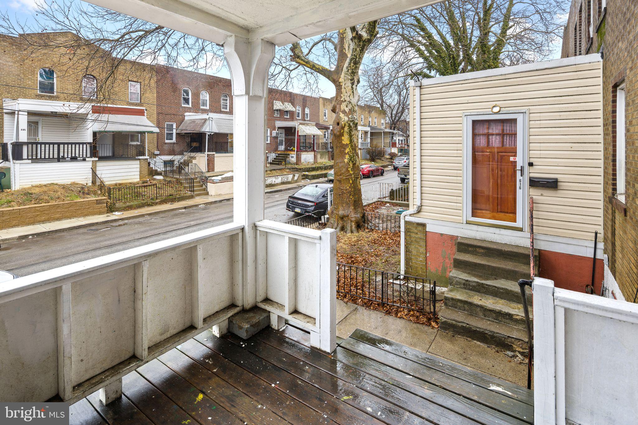 614 Littlecroft Road Upper Darby, PA 19082 - Photo 2 of 13 a view of a building with wooden floor and iron stairs