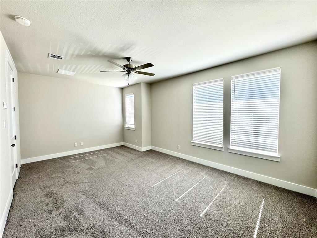 809 Meadowcrest Drive Plano, TX 75075 - Photo 15 of 30 a view of an empty room with a window