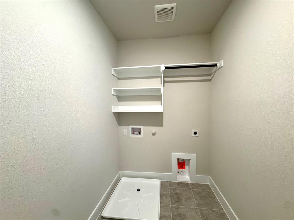 809 Meadowcrest Drive Plano, TX 75075 - Photo 28 of 30 a bathroom with a shower