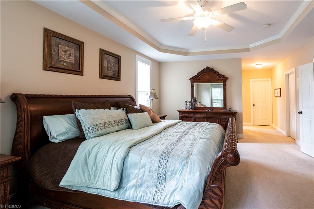8442 Alice Player Drive Oak Ridge, NC 27310 - Photo 11 of 30 Main Level Master Bedroom