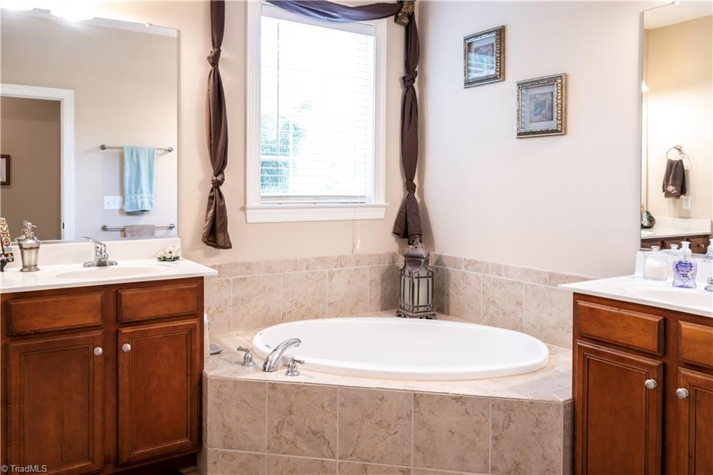 8442 Alice Player Drive Oak Ridge, NC 27310 - Photo 12 of 30 Master bath 1