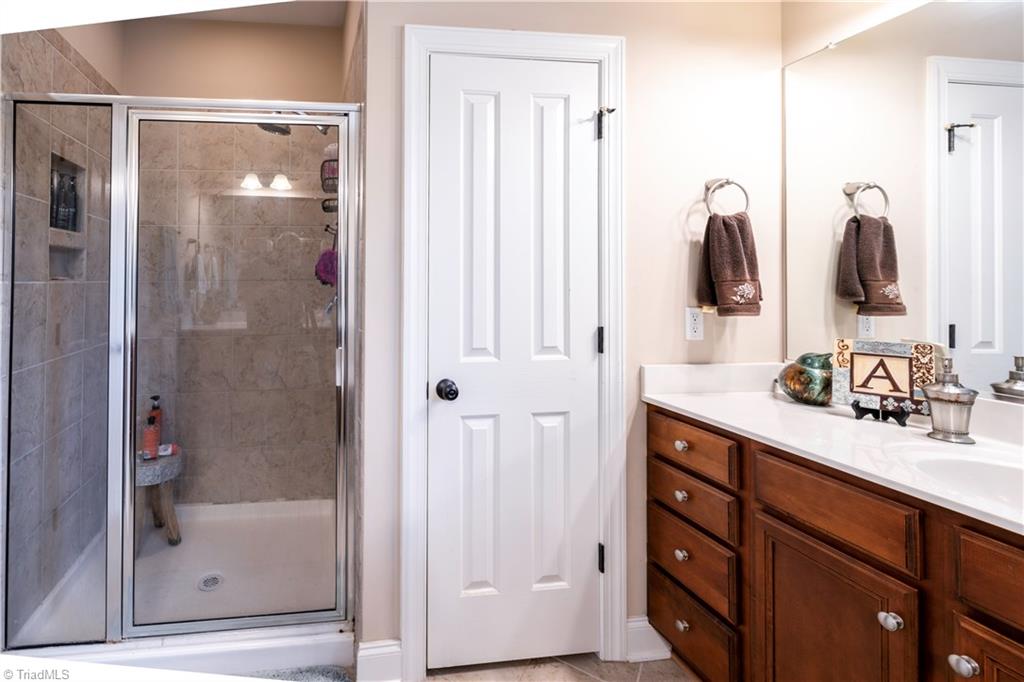 8442 Alice Player Drive Oak Ridge, NC 27310 - Photo 13 of 30 Master bath 2