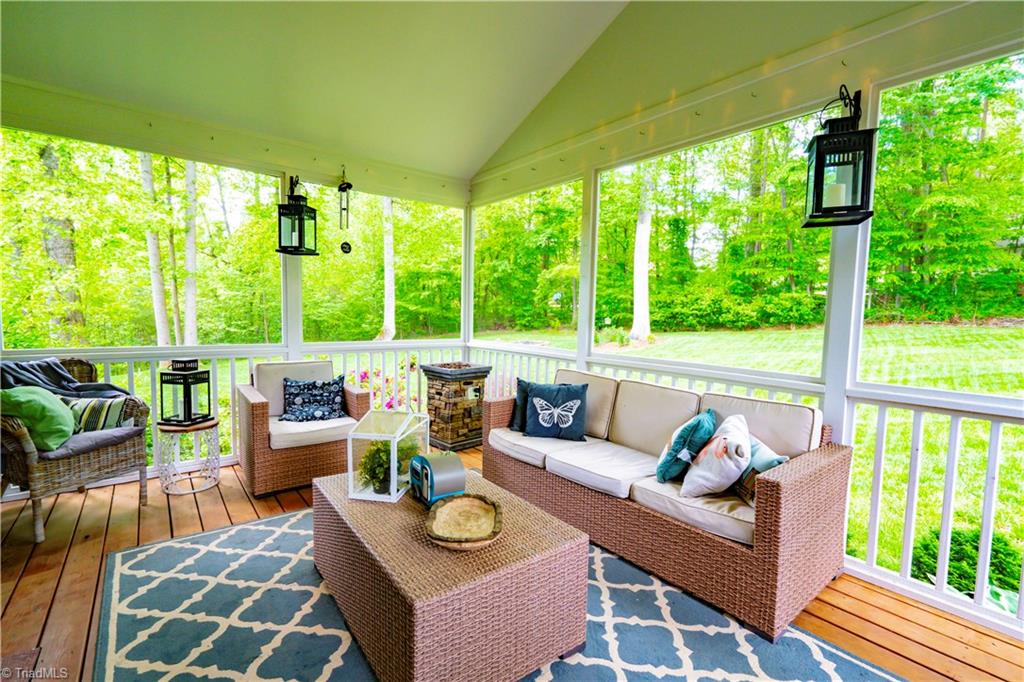 8442 Alice Player Drive Oak Ridge, NC 27310 - Photo 24 of 30 Screened porch 1