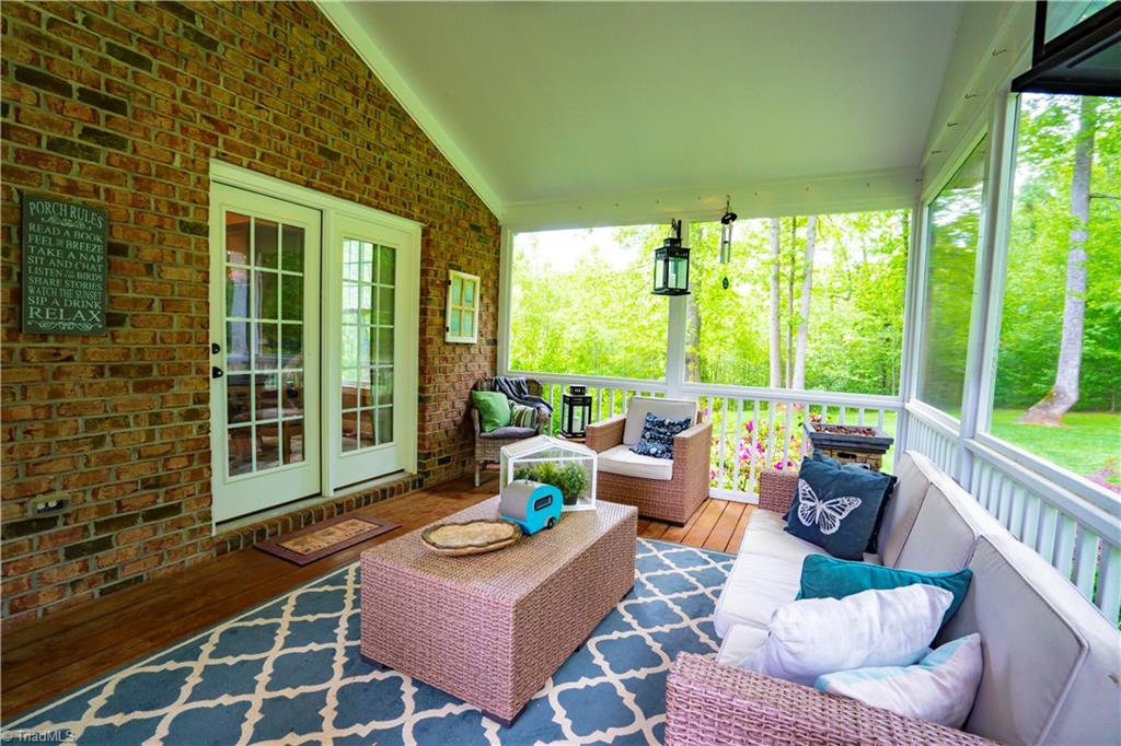 8442 Alice Player Drive Oak Ridge, NC 27310 - Photo 25 of 30 Screened porch 2