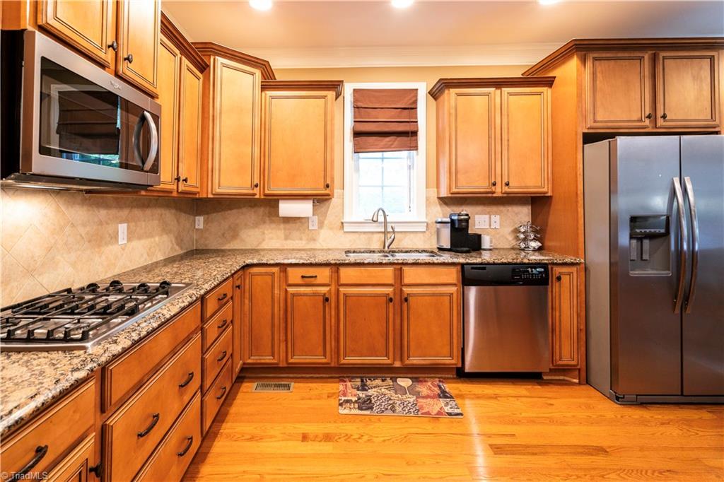 8442 Alice Player Drive Oak Ridge, NC 27310 - Photo 5 of 30 Kitchen angle 2