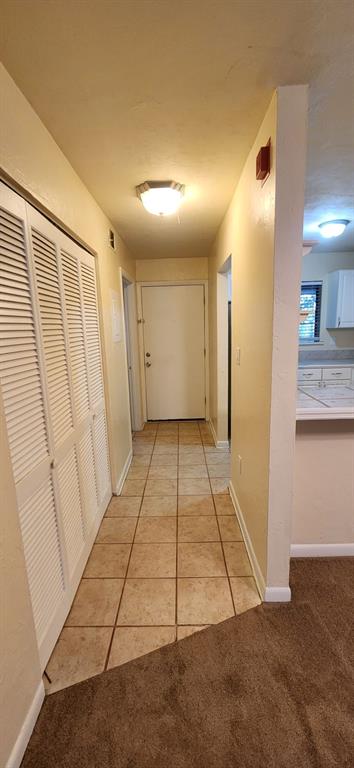 85 Southeast 16th Avenue, Unit F301 Gainesville, FL 32601 - Photo 6 of 15 a view of a hallway