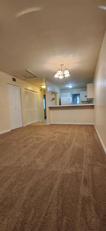 85 Southeast 16th Avenue, Unit F301 Gainesville, FL 32601 - Photo 7 of 15 a view of an empty room with a window