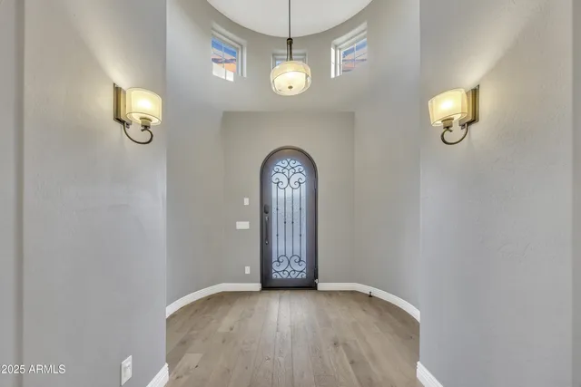 a view of entryway with wooden floor