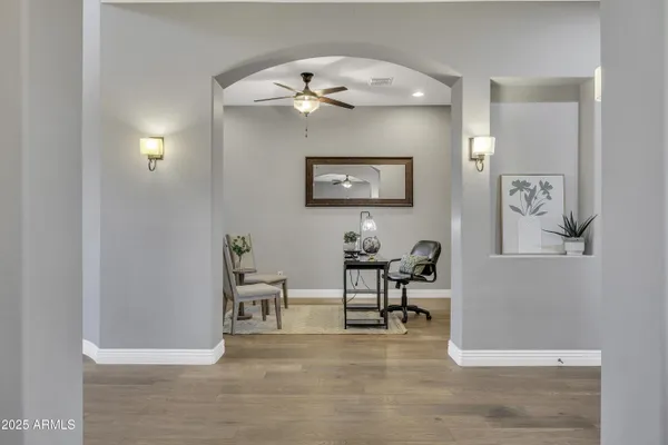 a view of a livingroom with table and couch