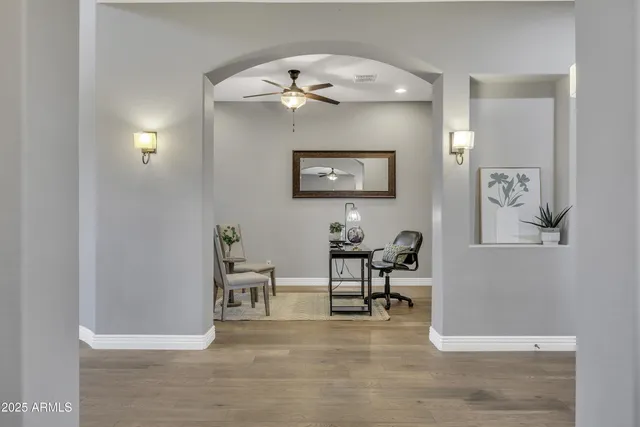 a view of a livingroom with table and couch