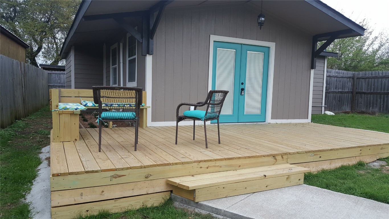 12410 Twin Creek Road Manchaca, TX 78652 - Photo 20 of 32 Deck featuring a fenced backyard