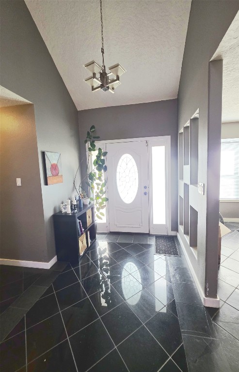 12410 Twin Creek Road Manchaca, TX 78652 - Photo 4 of 32 Entryway with vaulted ceiling