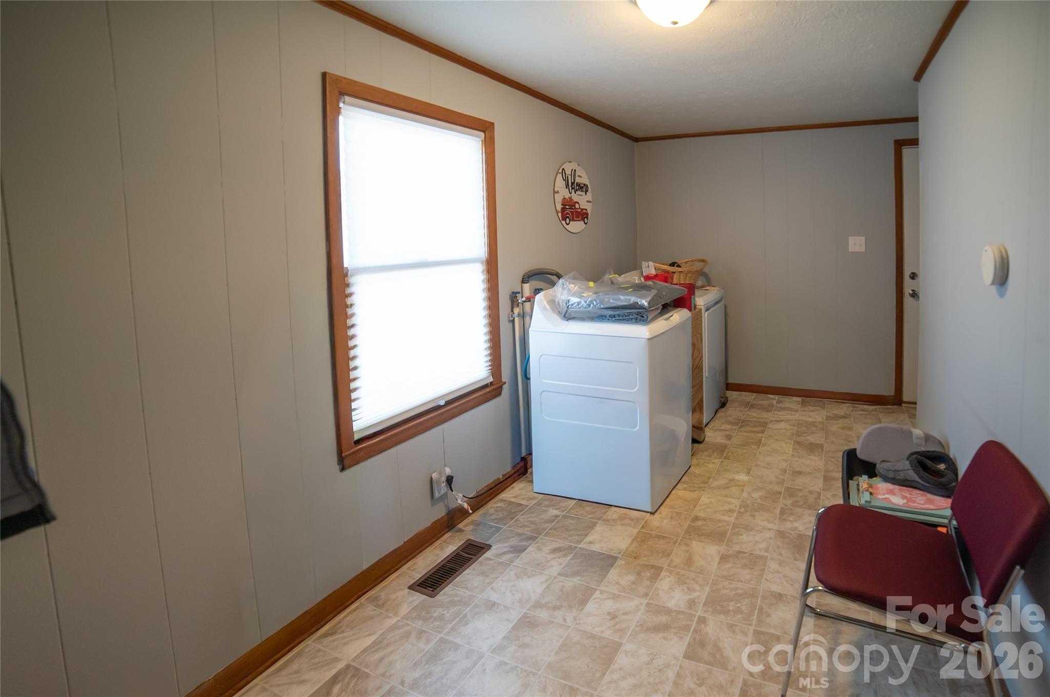 203 Cohen Street Morganton, NC 28655 - Photo 15 of 18 a room with furniture a rug and a window