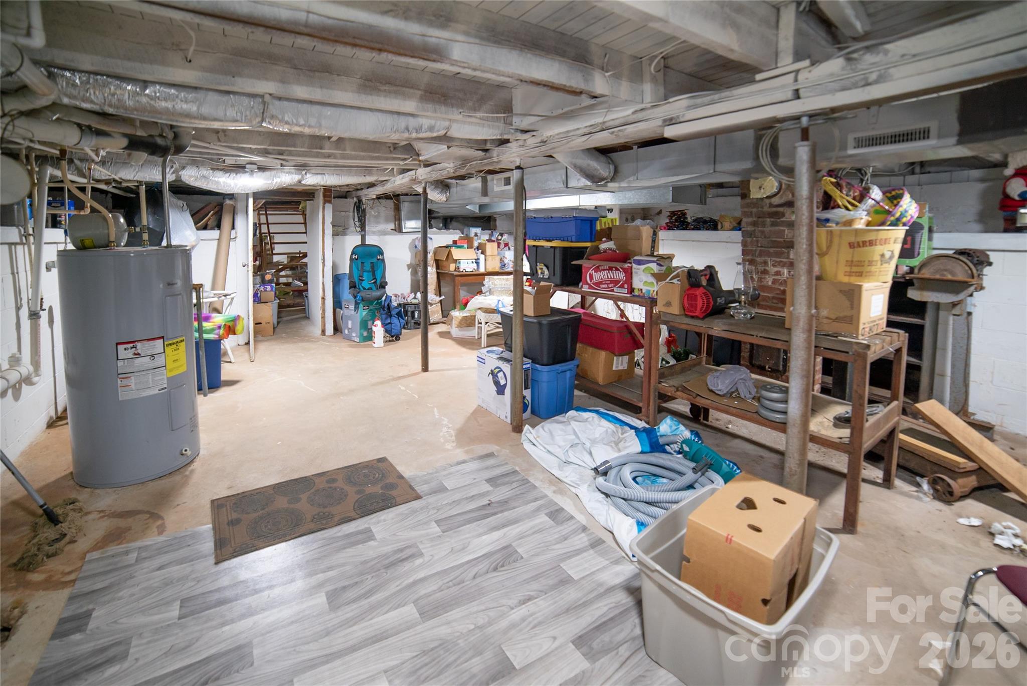 203 Cohen Street Morganton, NC 28655 - Photo 16 of 18 a view of store room with washer and dryer