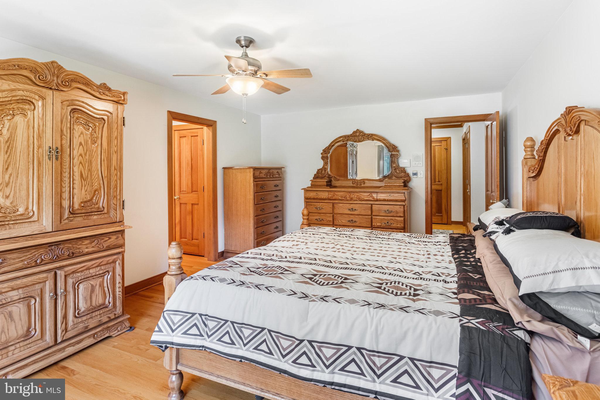 5119 Dickerson Road Partlow, VA 22534 - Photo 11 of 18 a bedroom with a bed and a dresser