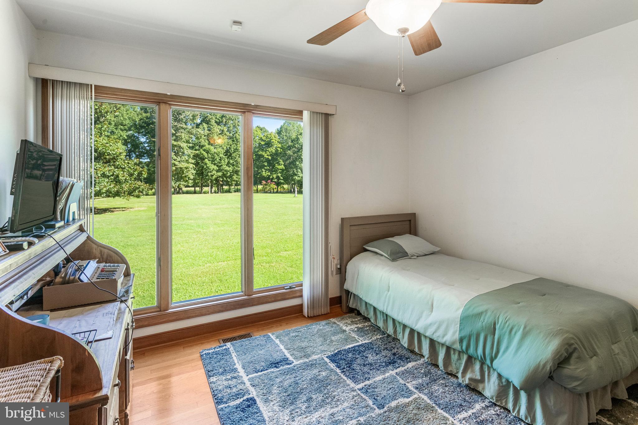 5119 Dickerson Road Partlow, VA 22534 - Photo 15 of 18 a bedroom with a bed and a window