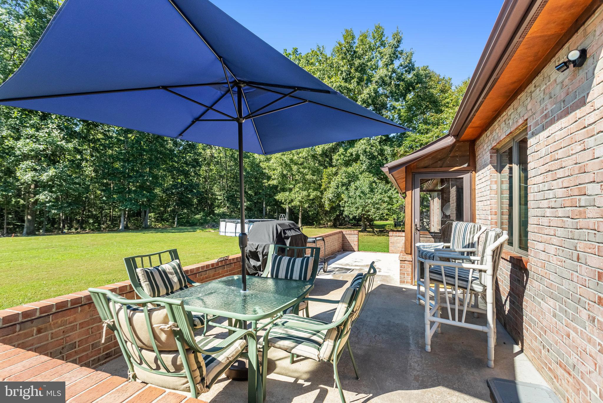 5119 Dickerson Road Partlow, VA 22534 - Photo 17 of 18 a view of an outdoor sitting area with furniture and backyard