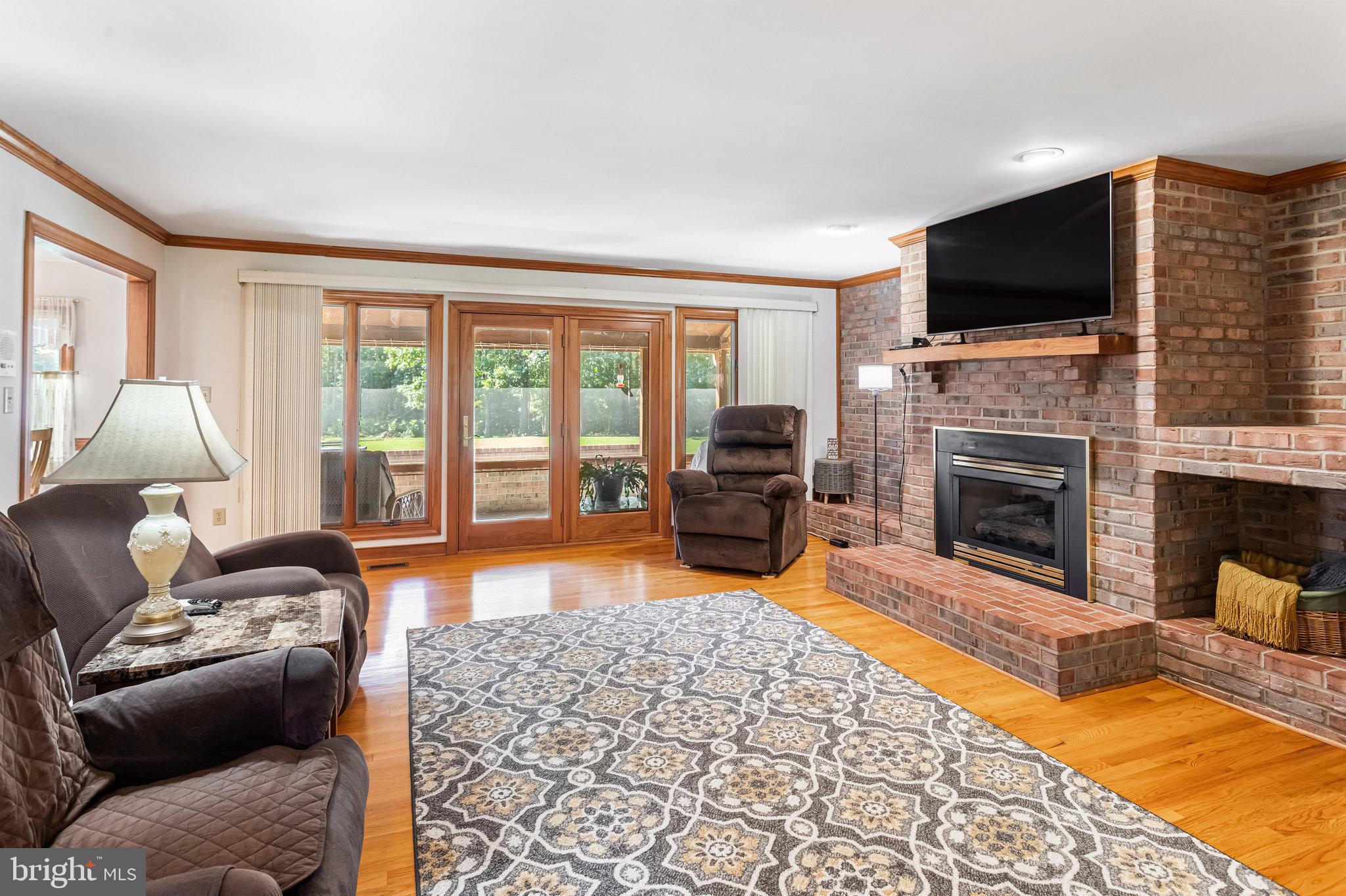 5119 Dickerson Road Partlow, VA 22534 - Photo 3 of 18 a living room with furniture fireplace and flat screen tv