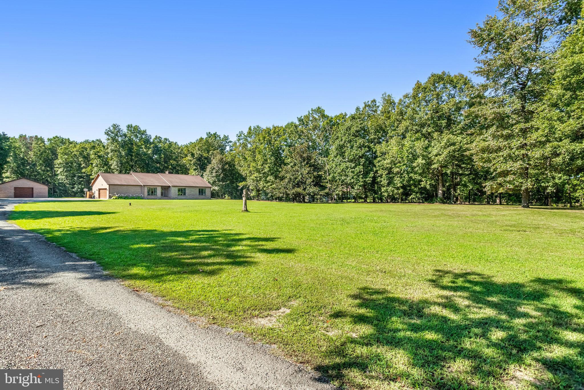 5119 Dickerson Road Partlow, VA 22534 - Photo 5 of 18 a view of a swimming pool with a yard
