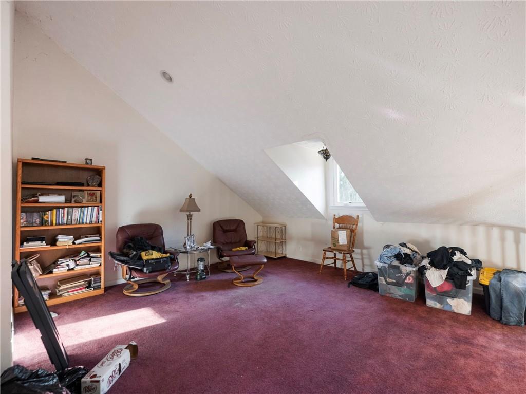 7389 Williams Road Flowery Branch, GA 30542 - Photo 16 of 49 a view of a kids room with gym equipment
