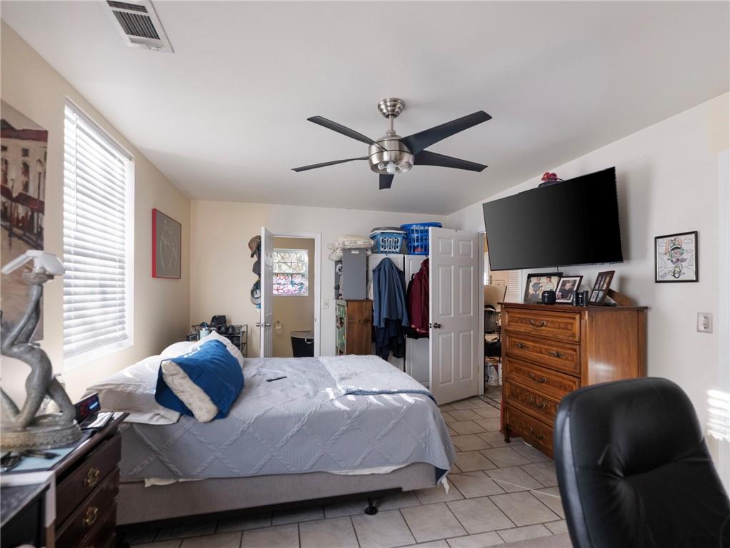 7389 Williams Road Flowery Branch, GA 30542 - Photo 30 of 49 a living room with furniture and a flat screen tv