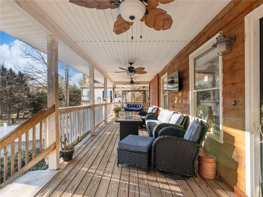 7389 Williams Road Flowery Branch, GA 30542 - Photo 43 of 49 a outdoor living space with furniture