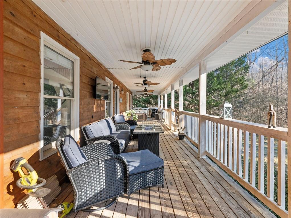 7389 Williams Road Flowery Branch, GA 30542 - Photo 44 of 49 a outdoor living space with furniture