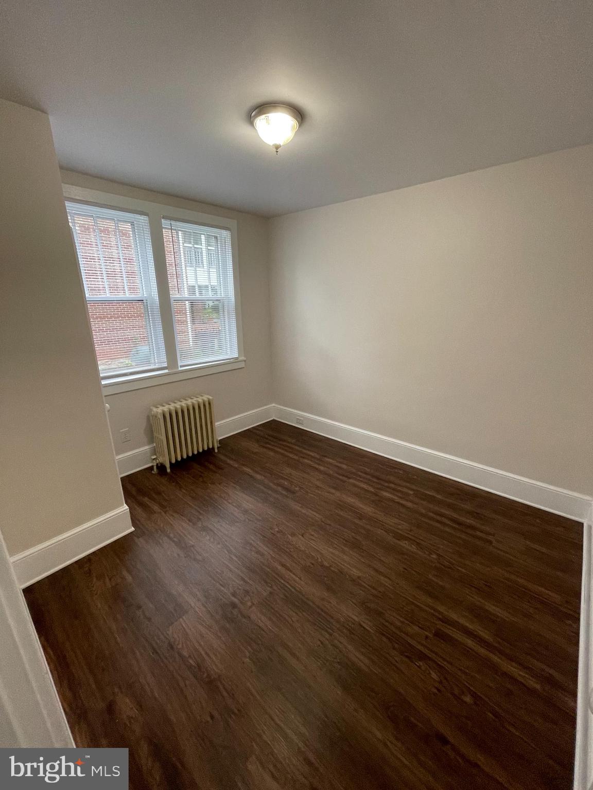 142 Riddle Road Chambersburg, PA 17201 - Photo 18 of 51 a view of an empty room with wooden floor and a window