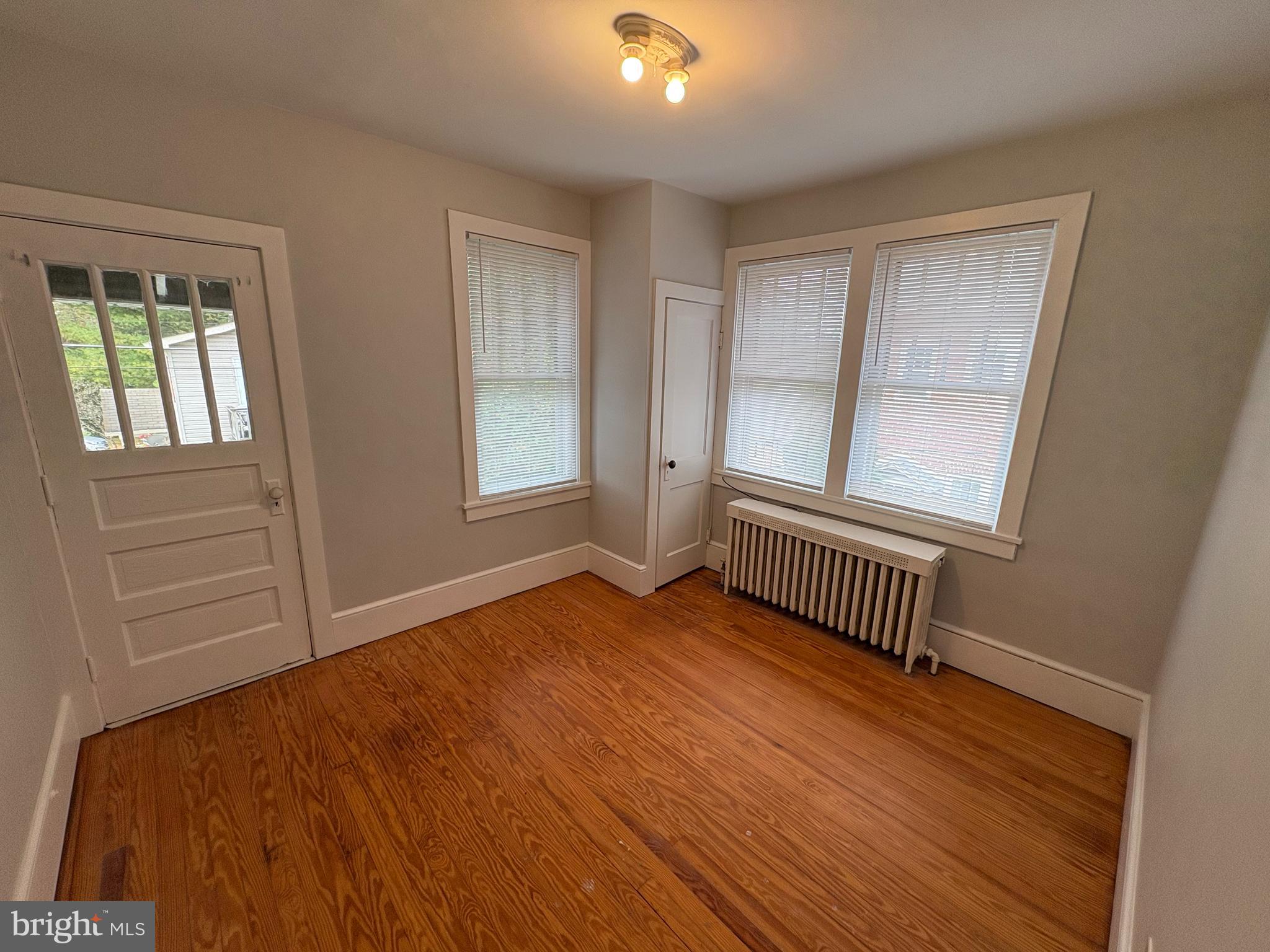 142 Riddle Road Chambersburg, PA 17201 - Photo 29 of 51 an empty room with wooden floor and windows