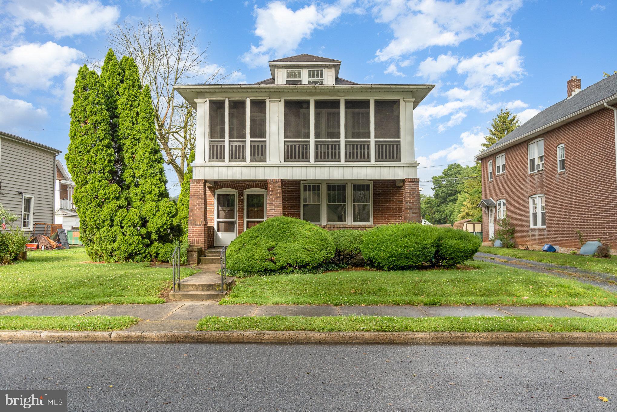 142 Riddle Road Chambersburg, PA 17201 - Photo 3 of 51 a front view of a house with a yard