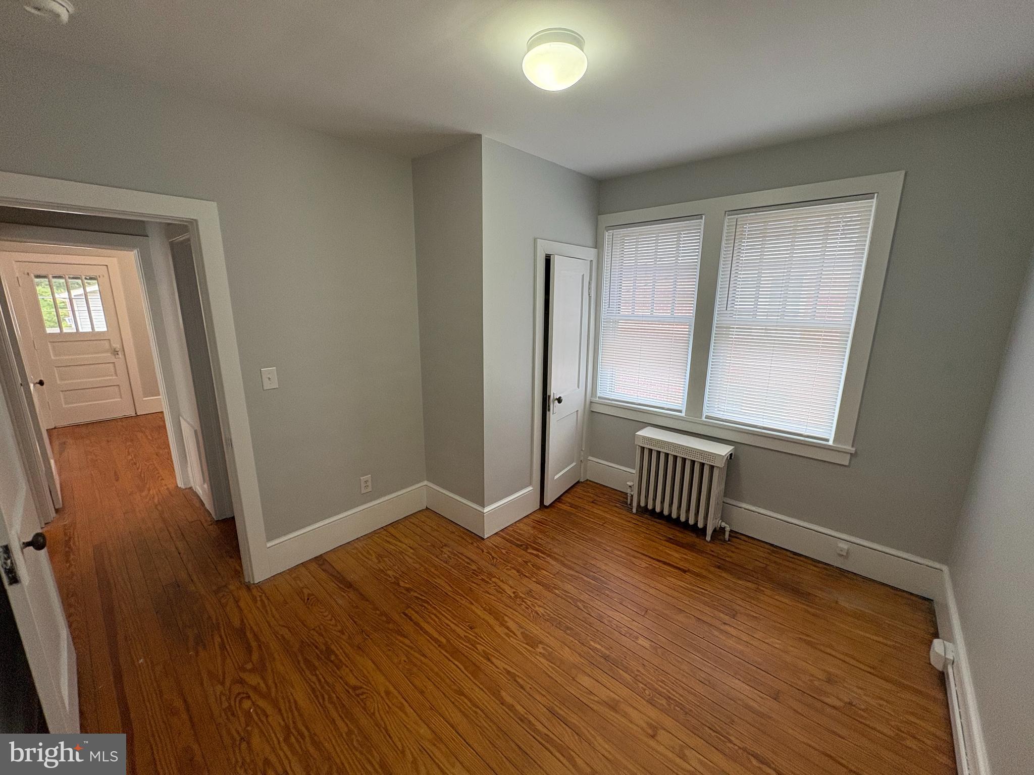 142 Riddle Road Chambersburg, PA 17201 - Photo 32 of 51 an empty room with wooden floor and windows
