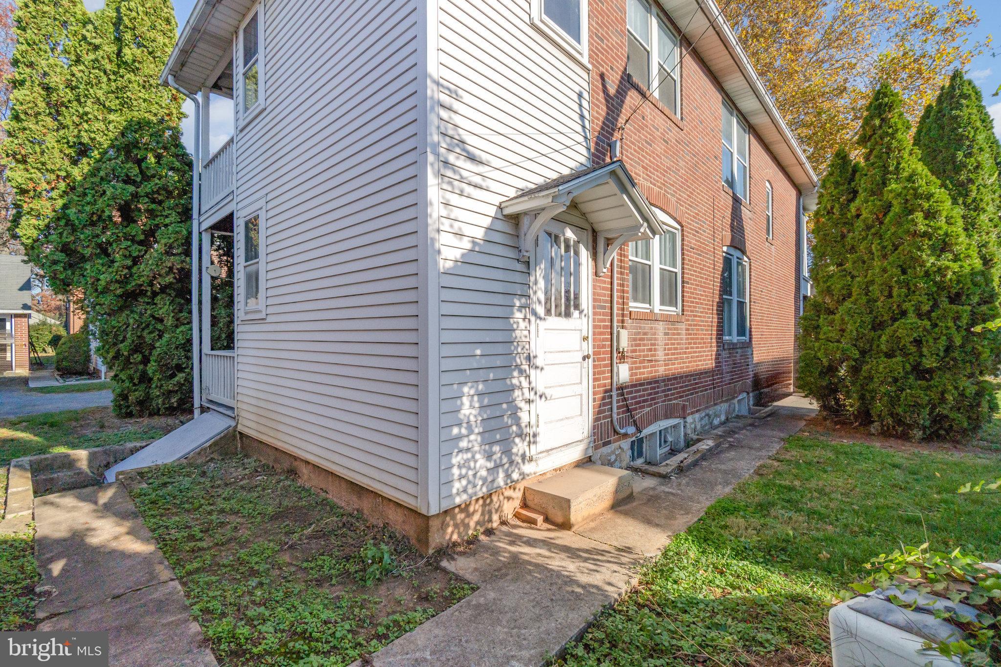 142 Riddle Road Chambersburg, PA 17201 - Photo 34 of 51 a front view of a house with garden