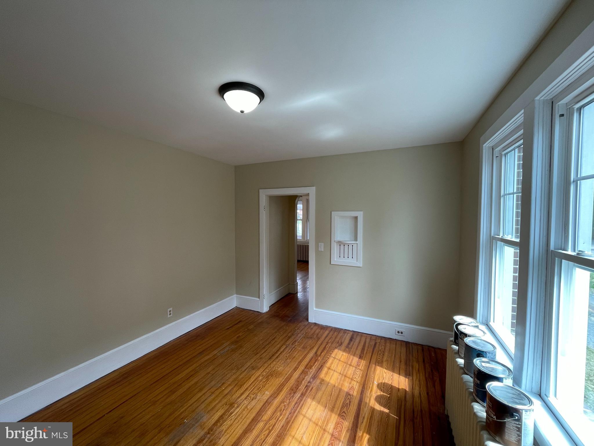 142 Riddle Road Chambersburg, PA 17201 - Photo 41 of 51 an empty room with wooden floor and windows