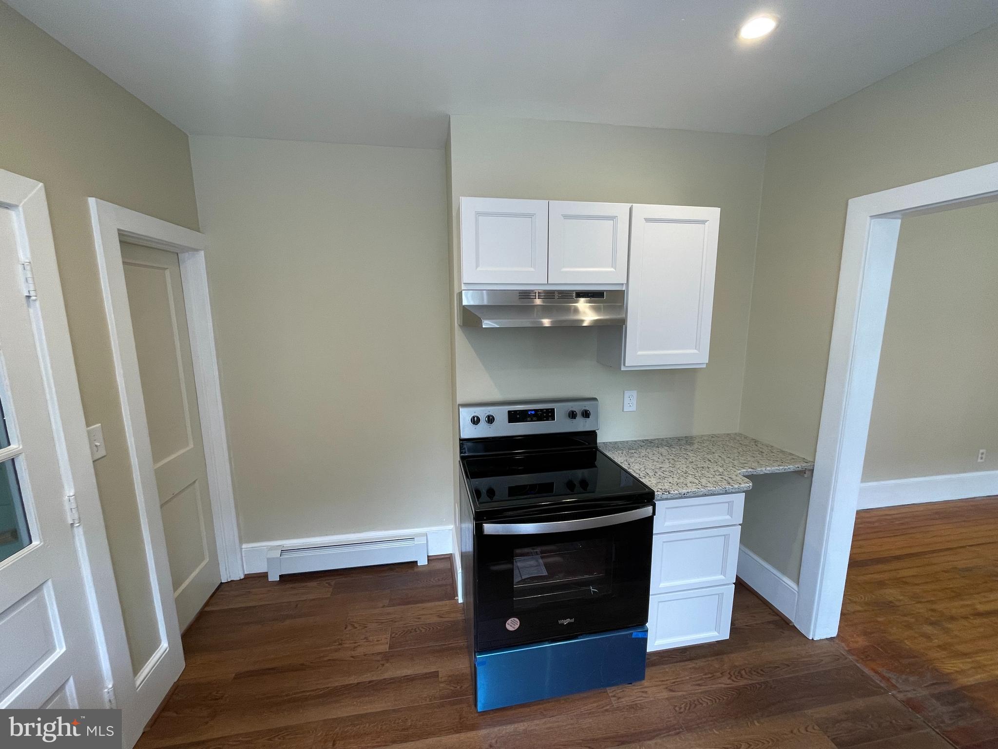 142 Riddle Road Chambersburg, PA 17201 - Photo 43 of 51 a kitchen with a refrigerator and a stove top oven