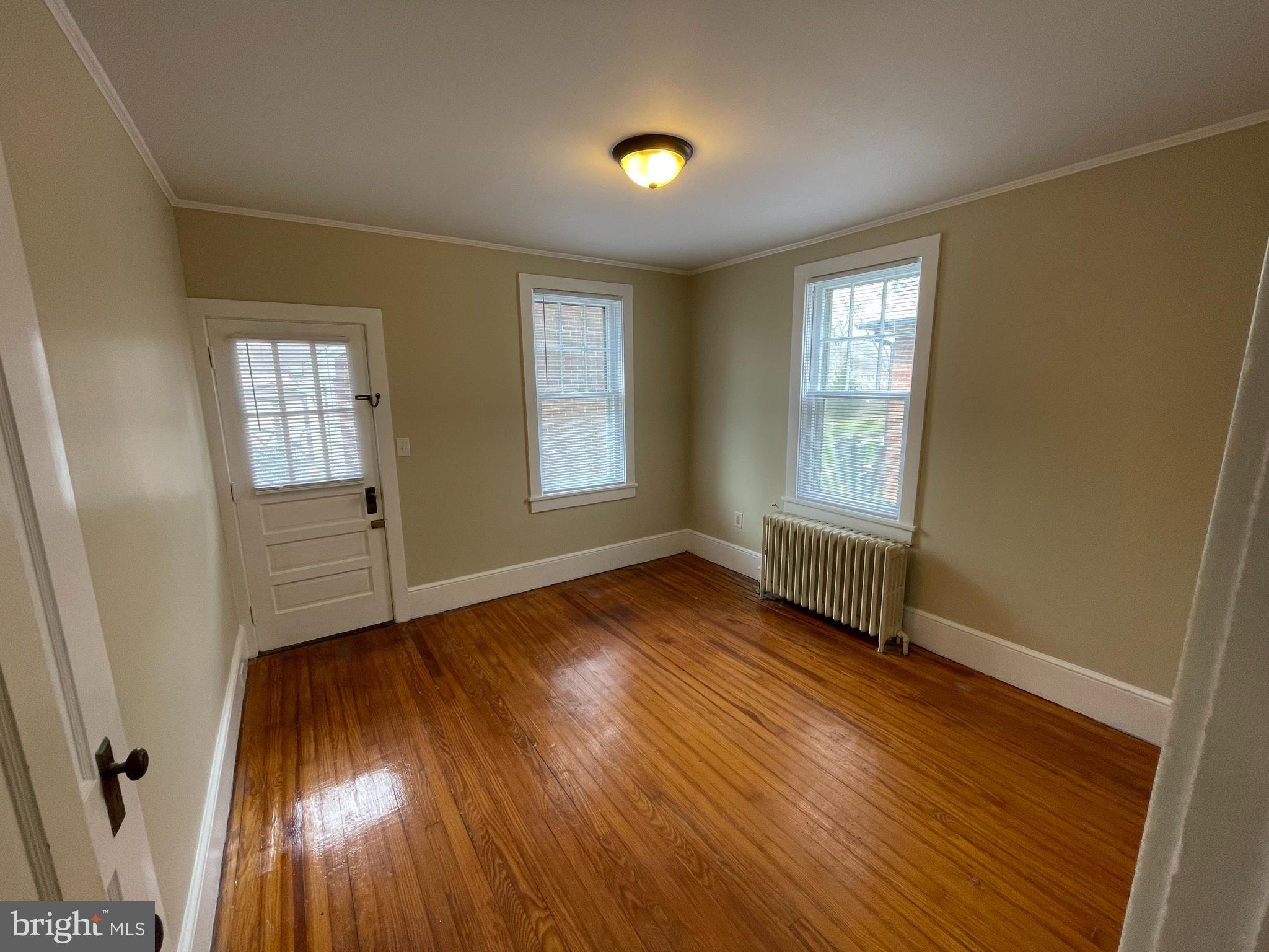 142 Riddle Road Chambersburg, PA 17201 - Photo 45 of 51 an empty room with windows and wooden floor