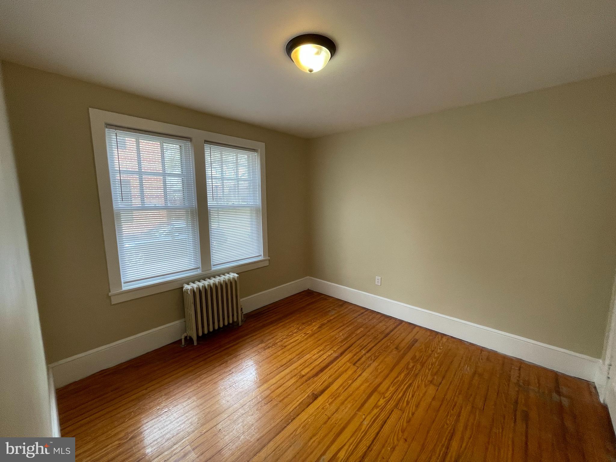 142 Riddle Road Chambersburg, PA 17201 - Photo 49 of 51 an empty room with wooden floor and windows