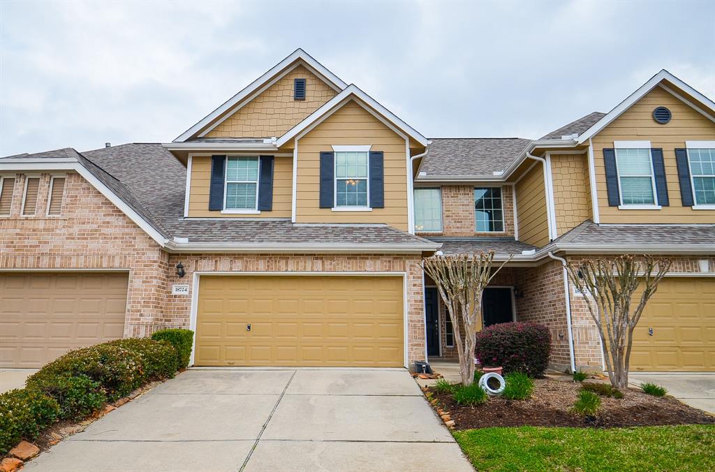 18724 Cypress Loch Drive Spring, TX 77379 - Photo 1 of 24 a front view of a house with garden